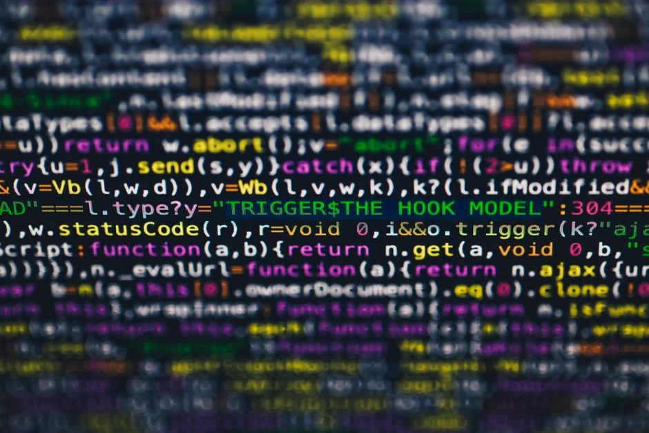 OpenAI Website with Introduction to ChatGPT on Computer Monitor
